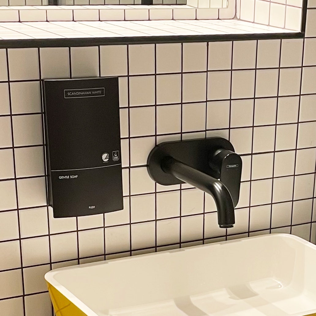 The Snug Townhouse hotel room wash basin and black tap 